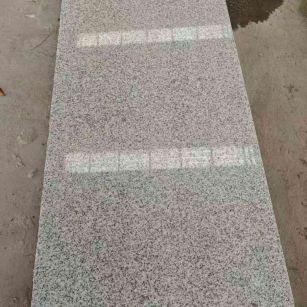 菏泽芝麻白光面毛板